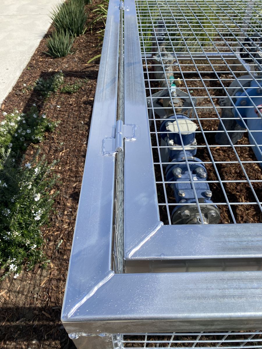 Close-up of galvanised steel cage frame, hinge and welds | EcoScape Gardens