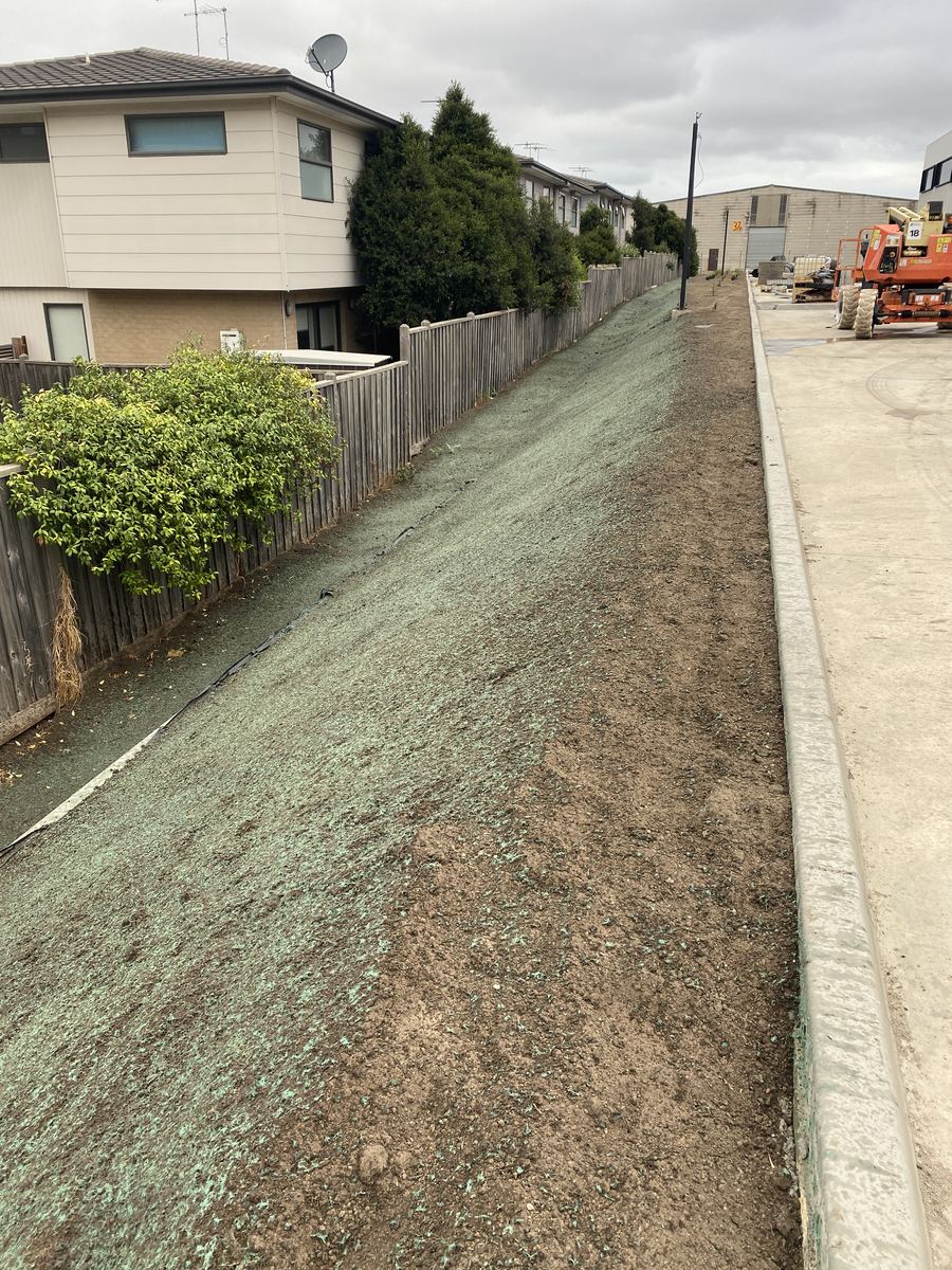 Freshly hydroseeded embankment on a new industrial development