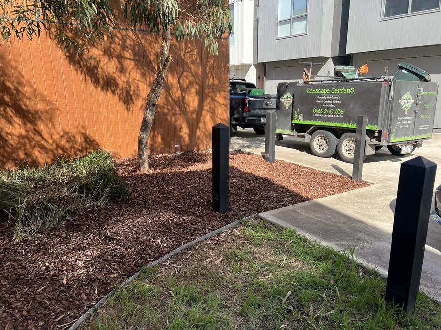 Fresh mulch around bollards — Weed-suppressed & tidy | EcoScape Gardens