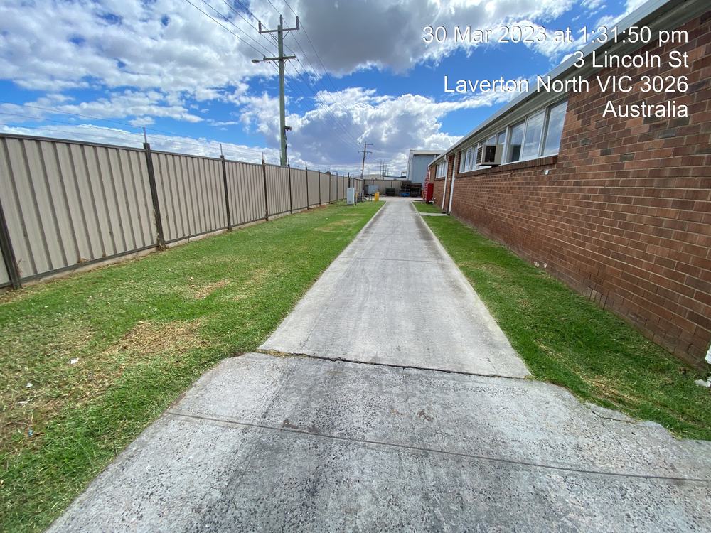 West Melbourne grounds maintenance — Laverton North — industrial laneway, timestamped on the day | EcoScape Gardens